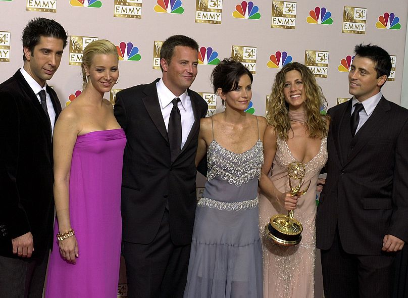 Friends stars pose after the show won outstanding comedy series at the 54th Annual Primetime Emmy Awards, 22 September 2002
