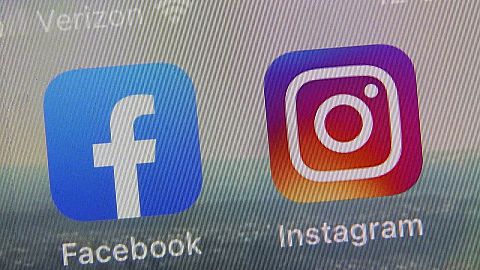 Facebook and Instagram applications seen on a phone. 