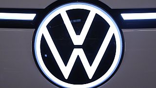This is the Volkswagen logo on the front of the 2025 Volkswagen ID. Buzz on display at the Pittsburgh International Auto Show in Pittsburgh, Feb. 14, 2025. 