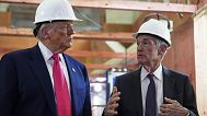 President Donald Trump listens as Federal Reserve Chairman Jerome Powell speaks during a visit to the Federal Reserve, Thursday, July 24, 2025, in Washington. 