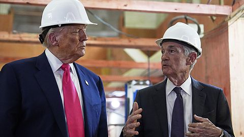 President Donald Trump listens as Federal Reserve Chairman Jerome Powell speaks during a visit to the Federal Reserve, Thursday, July 24, 2025, in Washington. 