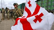 Georgian soldiers take part in a ceremony ahead of the military training exercise Agile Spirit outside Tbilisi, 18 March, 2013