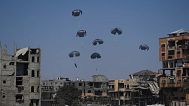 Humanitarian aid is airdropped to Palestinians over northern Gaza Strip, Sunday, July 27, 2025. (AP Photo/Abdel Kareem Hana)