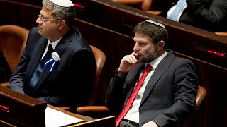 Israeli lawmakers Itamar Ben Gvir and Bezalel Smotrich attend the swearing-in ceremony for Israel's parliament, at the Knesset, in Jerusalem, Nov. 15, 2022. 