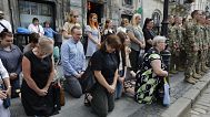 People pay respect to 12 Ukrainian soldiers who died in Russian captivity
