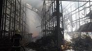 Firefighters tackle the blaze after a Russian air attack that hit a food warehouse in Kharkiv, 30 July, 2025
