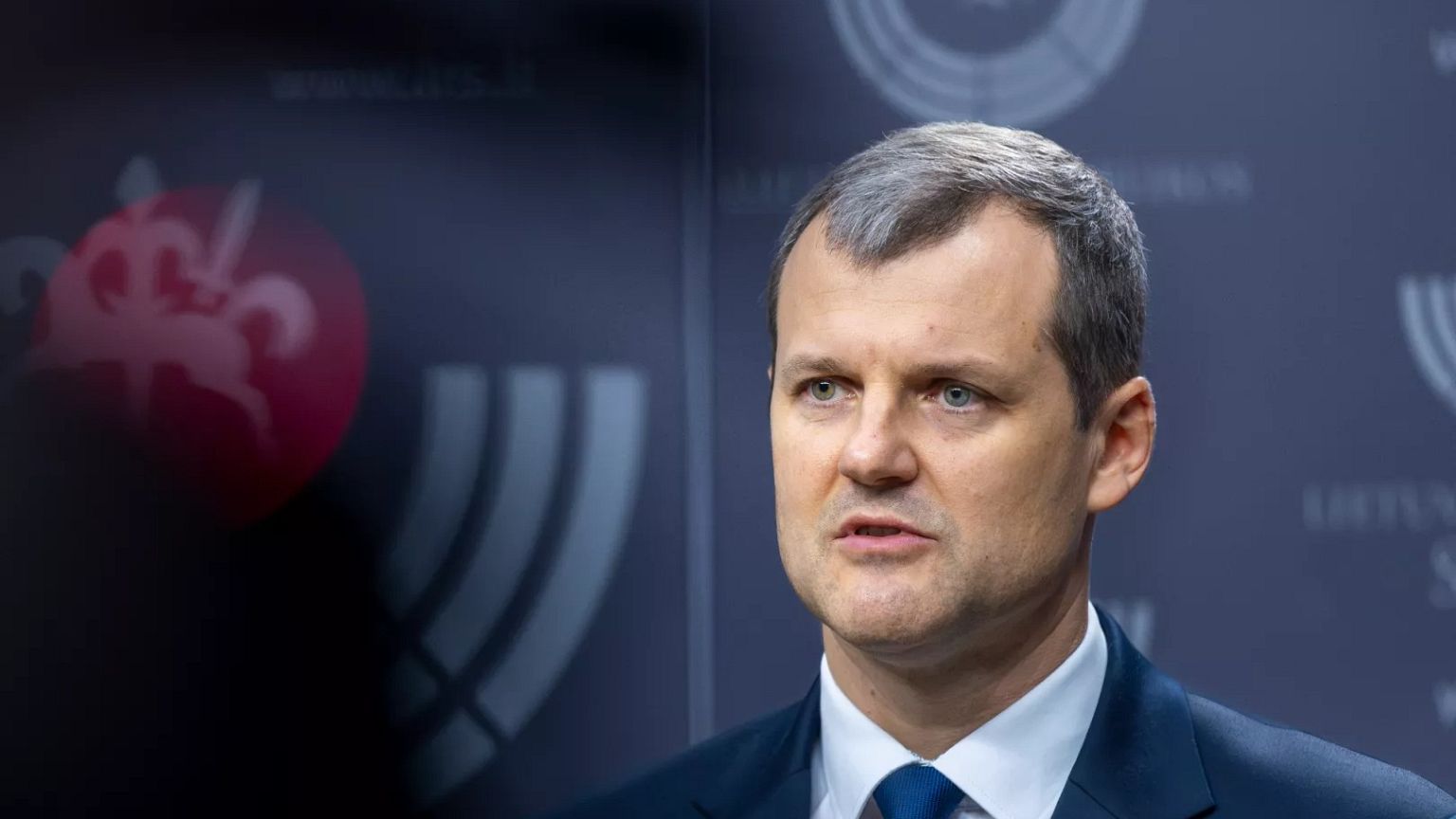 Lithuania's Prime Minister Gintautas Paluckas speaks to the media at the Parliament in Vilnius, 21 November, 2024