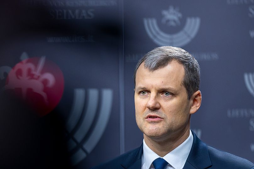 Lithuania's former Prime Minister Gintautas Paluckas speaks to the media at the parliament in Vilnius, 21 November, 2024