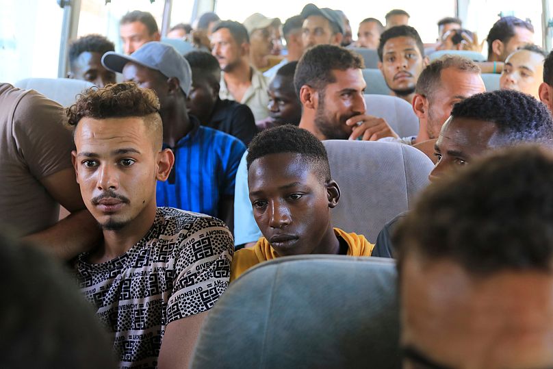 A group of migrants are seen after they are arrested by authorities in Tripoli, 26 July, 2025 