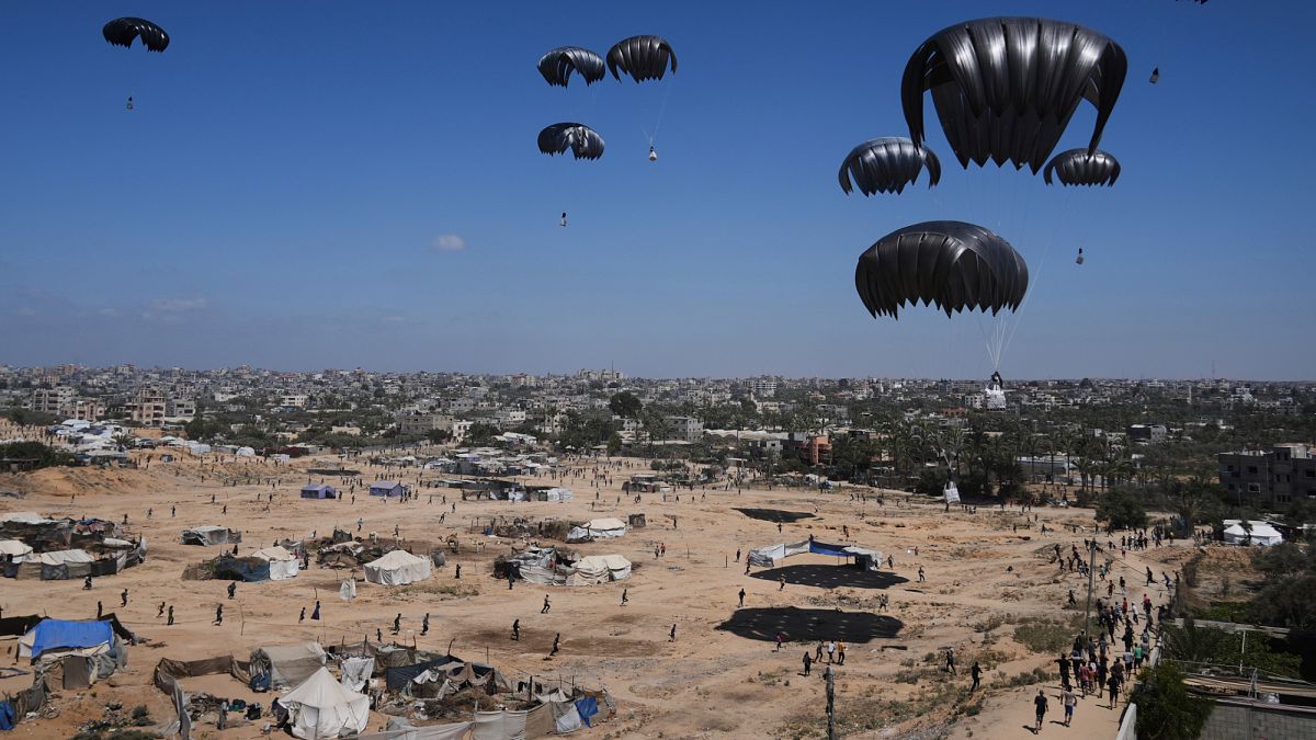 Planes drop humanitarian aid into Gaza Strip as Israeli fire reportedly kills at least 18