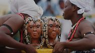 People dressed in costumes perform during the mask festival in Porto-Novo, Benin, Sunday, Aug. 3, 2025.