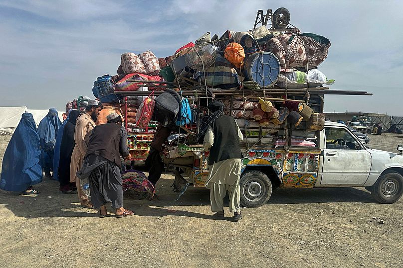 Afghan refugees prepare to go home from a transit station setup to facilitate Afghan refugees' deportations in Chaman, 9 April, 2025