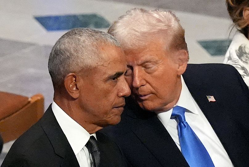 Former President Barack Obama talks with President-elect Donald Trump before the state funeral for Jimmy Carter in Washington, 9 January, 2025