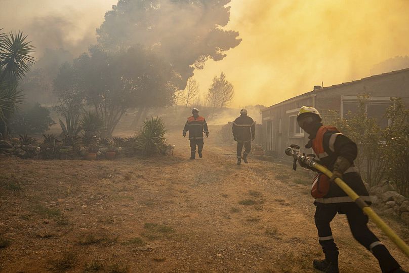 This photo provided by the Securite Civile shows firefighters battling a wildfire in a Mediterranean region near the Spanish border, 5 August, 2025