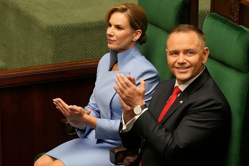 Karol Nawrocki podczas uroczystości zaprzysiężenia na urząd Prezydenta RP wraz z małżonką.