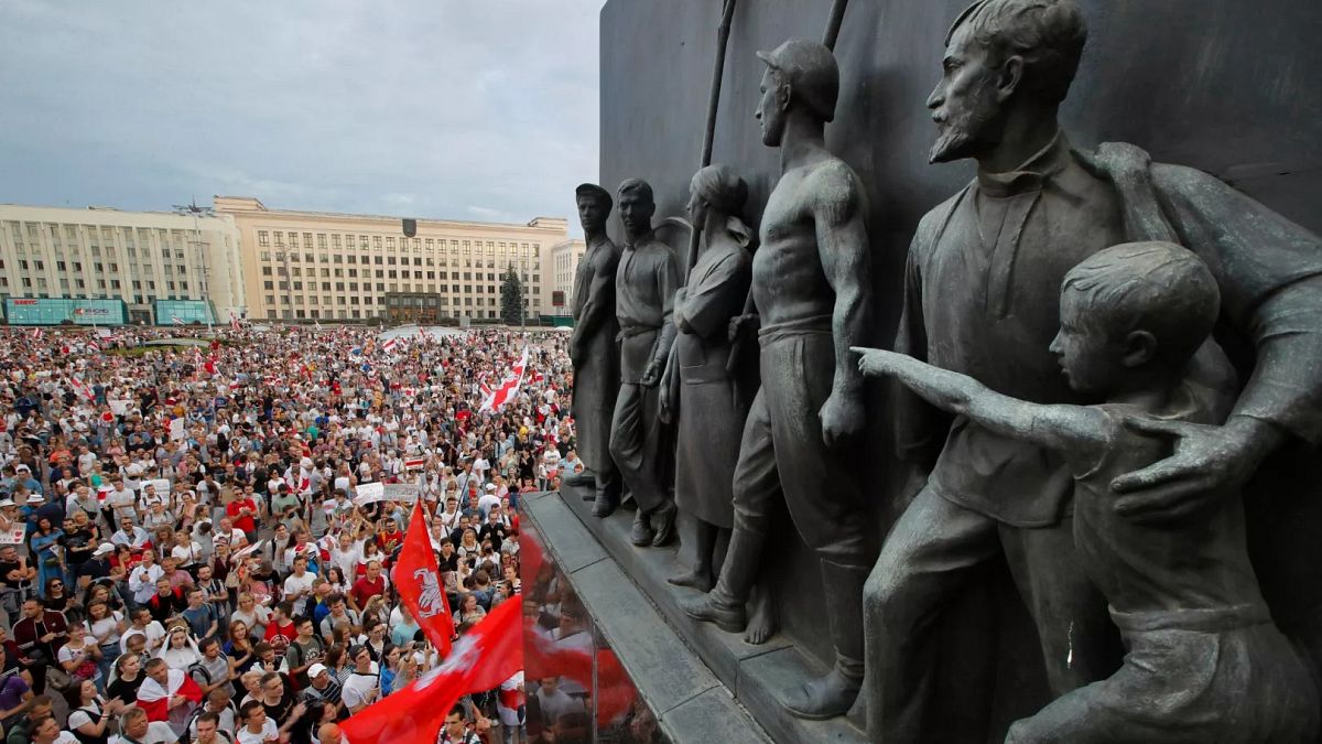 Belarus targets government critics with continued raids and detention, activists say