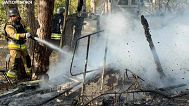 In this photo provided by the Ukrainian Emergency Service, firefighter extinguish a fire after a Russian strike in Zaporizhzhia, Ukraine, Wednesday, Aug. 6, 2025.