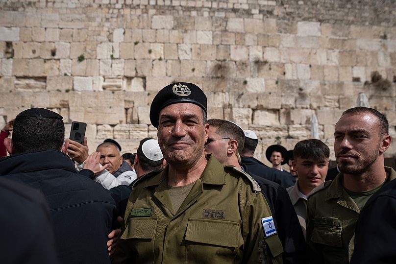 Israel's military chief of staff Eyal Zamir places notes on the Western Wall in Jerusalem on 5 March 2025