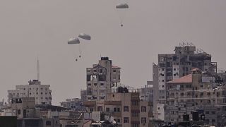 Humanitarian aid is airdropped to Palestinians over Gaza City, northern Gaza Strip, 8 August 2025