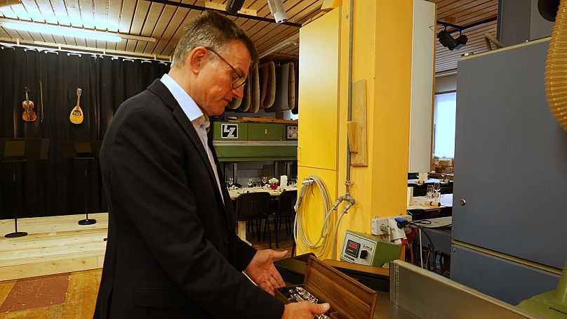 Carpenter Elmar Kalb shows the flute cases he invented in his workshop in Dornbirn, Austria.