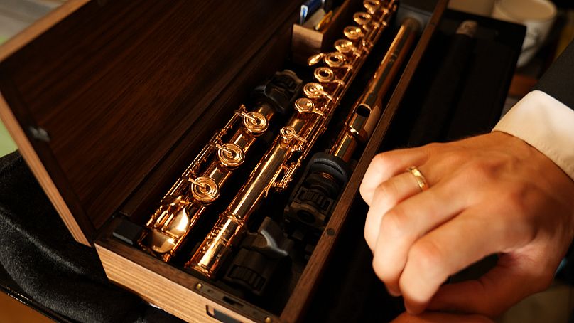 Vienna Symphony Orchestra Principal Flutist Stefan Tomaschitz shows his flute in the case manufactured by Elmar Kalb