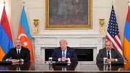 US President Donald Trump sits during a trilateral signing with Azerbaijan's President Ilham Aliyev and Armenia's Premier Nikol Pashinyan in the White House, 8 August 2025