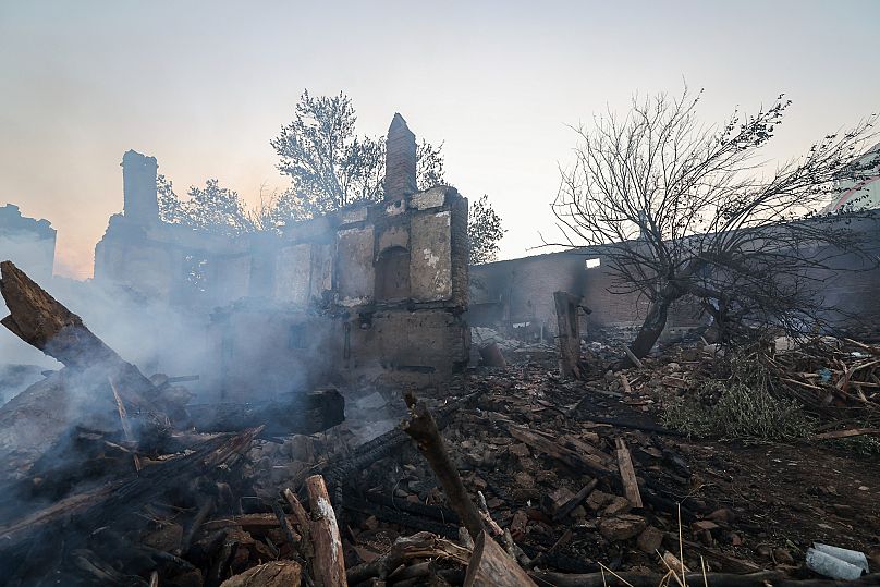 Smoke rises from the rubble following a fire in Sacakli, Canakkale province, northwest, Saturday, Aug. 9, 2025.