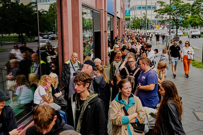 People line up for the opening of Germany's first shop for Labubu plush dolls in Berlin, Germany - Friday 25 July 2025