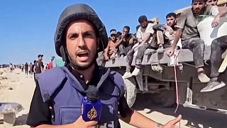 This undated image taken from video broadcast by Al Jazeera shows the network's Arabic-language Gaza correspondent Anas al-Sharif reporting in Gaza
