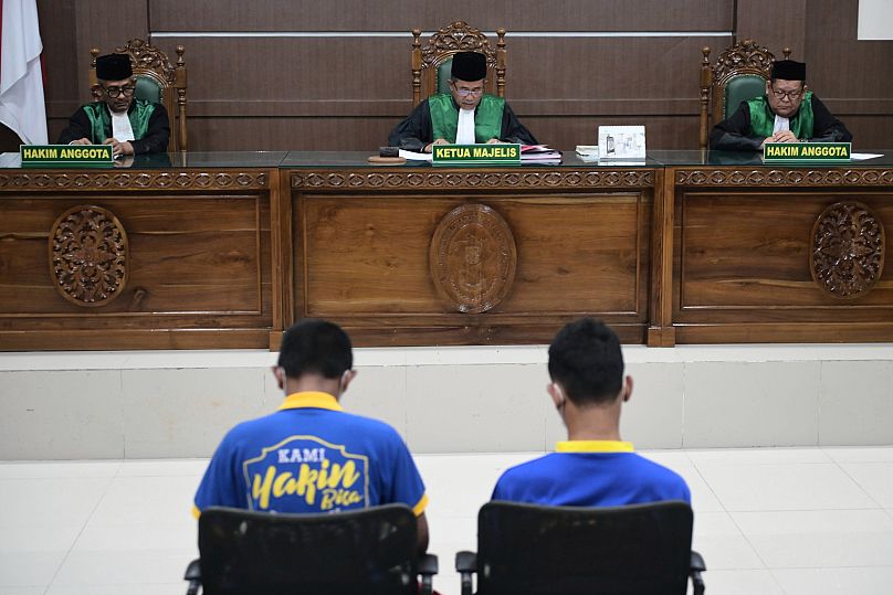 Chief Judge Rokhmadi reads his verdict during the sentencing hearing for two men accused of having gay sex at the Sharia Court in Banda Aceh, 11 August, 2025