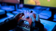 A boy plays an Xbox game at Paris Games Week in Paris on Friday, November 3, 2017.