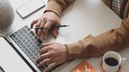 Person drafting email.