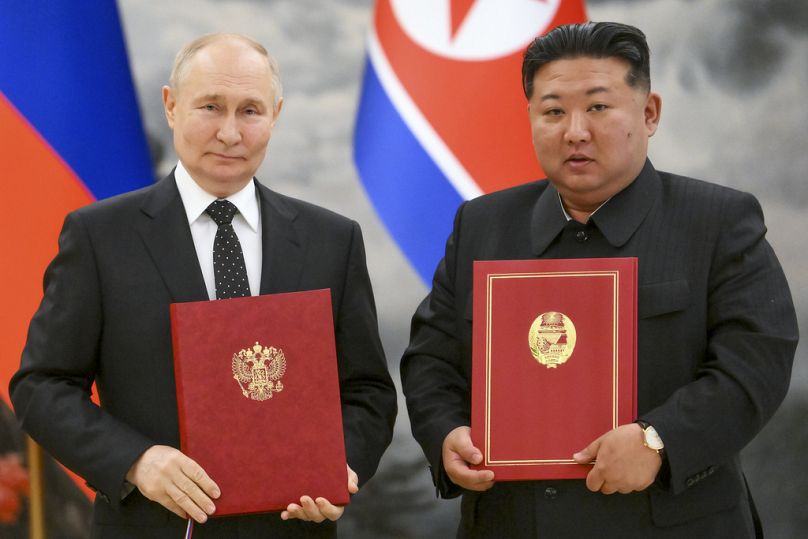 FILE - Russian President Vladimir Putin, left, and North Korea's leader Kim Jong Un pose for a photo during a signing ceremony of the new partnership in Pyongyang, North Korea
