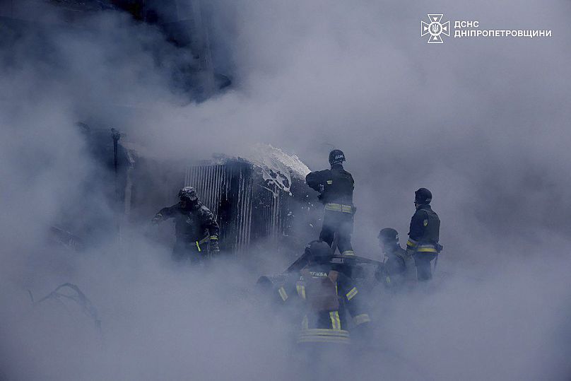 Firefighters put out a fire following a Russian missile attack on the country's energy system in Dnipropetrovsk region, 25 December, 2024