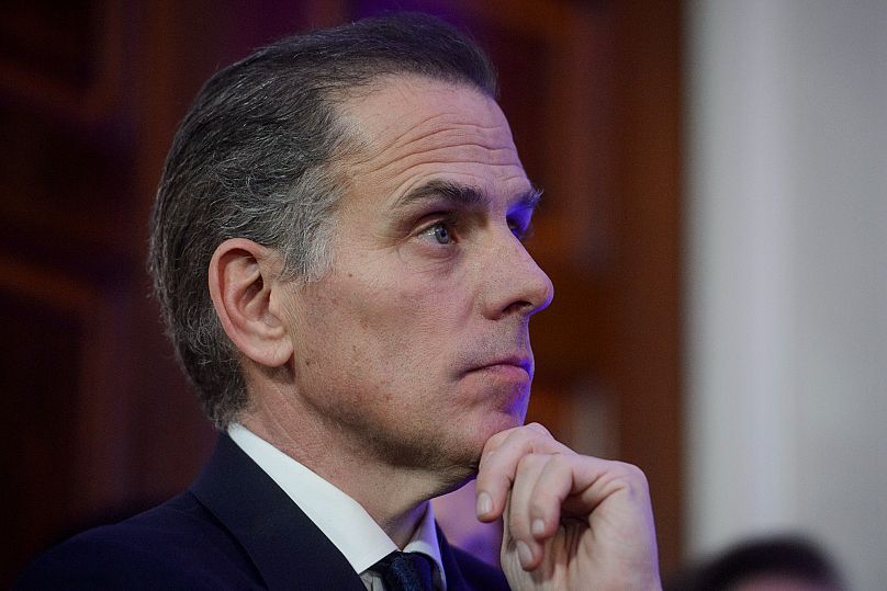 FILE - Hunter Biden listens while his father, the then President Joe Biden, talks at the White House in Washington on 16 December, 2024. 
