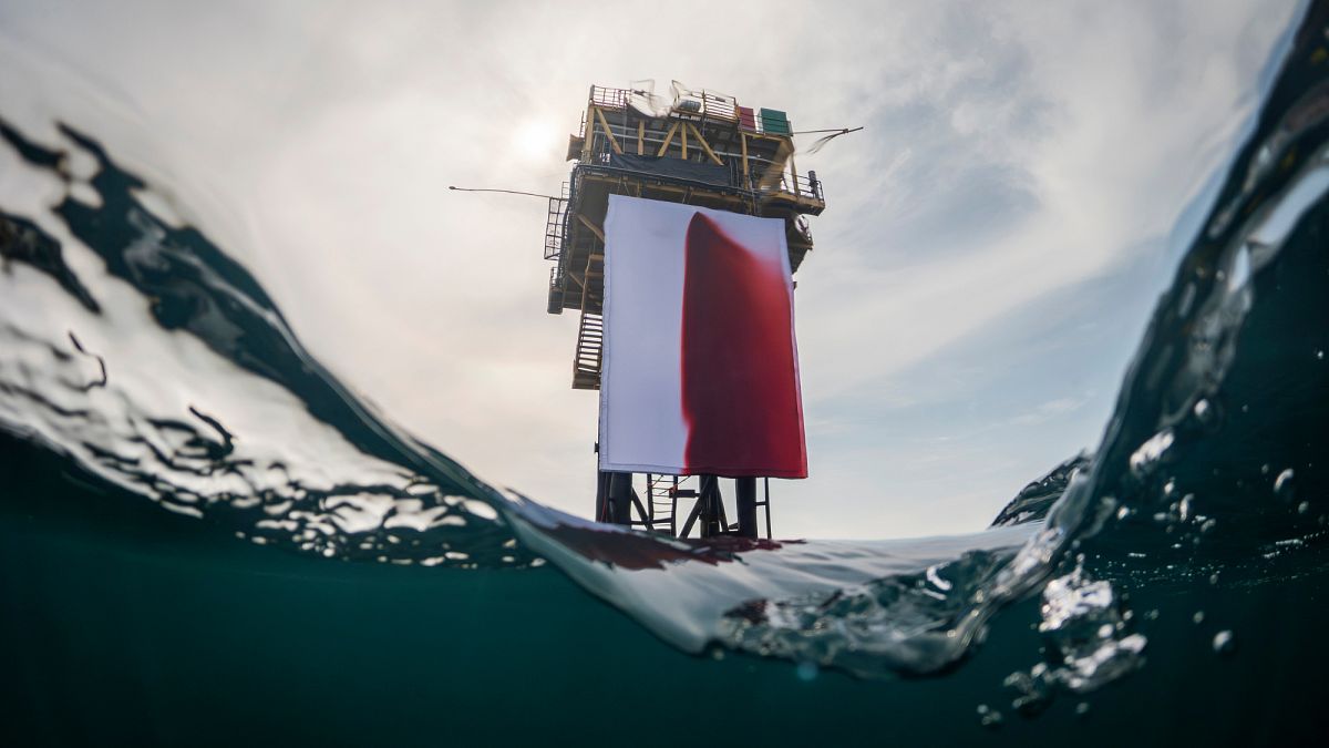 Greenpeace activists deploy huge Anish Kapoor artwork 'BUTCHERED' on North Sea gas platform