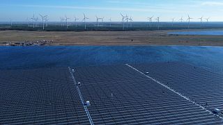 Floating solar panels operate on the Cottbuser Ostsee lake near Cottbus, Germany.
