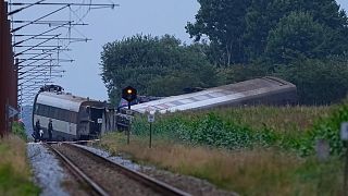 Emergency services attend the passengers involved in a train derailment at the village of Bjerndrup, 15 August, 2025