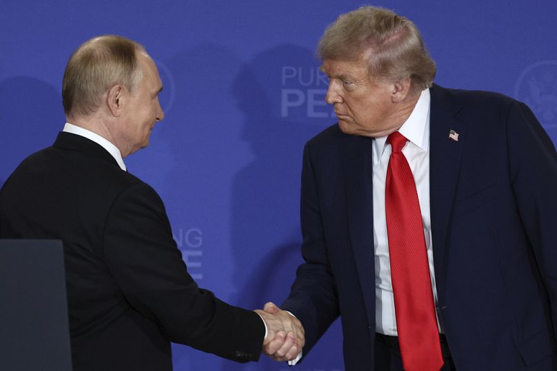 US President Donald Trump shakes hands with Russia's President Vladimir Putin during a joint press conference at Joint Base Elmendorf-Richardson, Alaska, Friday, Aug. 15, 2025