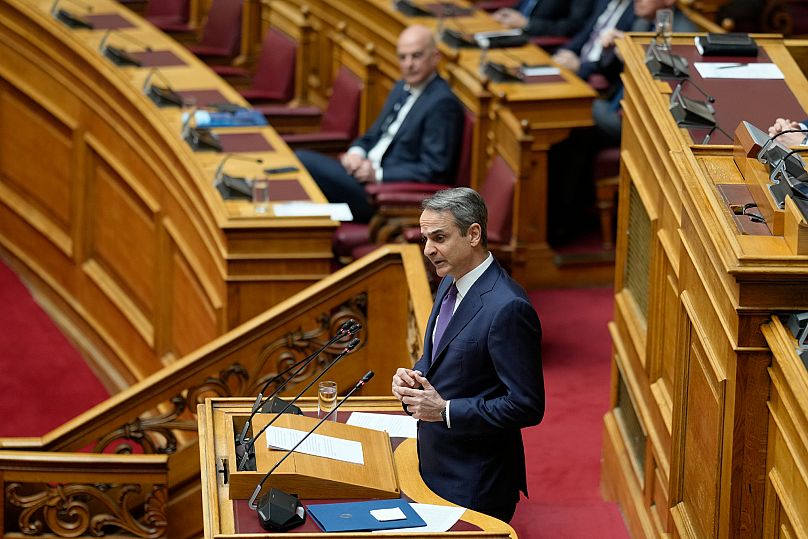 Greece's Prime Minister Kyriakos Mitsotakis speaks in the parliament in Athens, 2 April, 2025