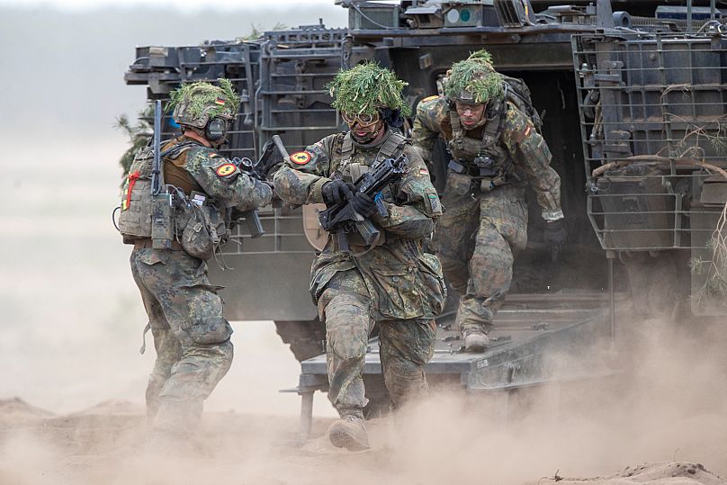 German soldiers take part in the Lithuanian-German division-level international military exercise 'Grand Quadriga 2024' at a training range in Pabrade, 29 May, 2024