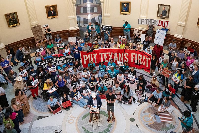 Activists protest against mid-decade redistricting at the Texas Capitol in Austin, Texas, Wednesday, 20 August 2025.
