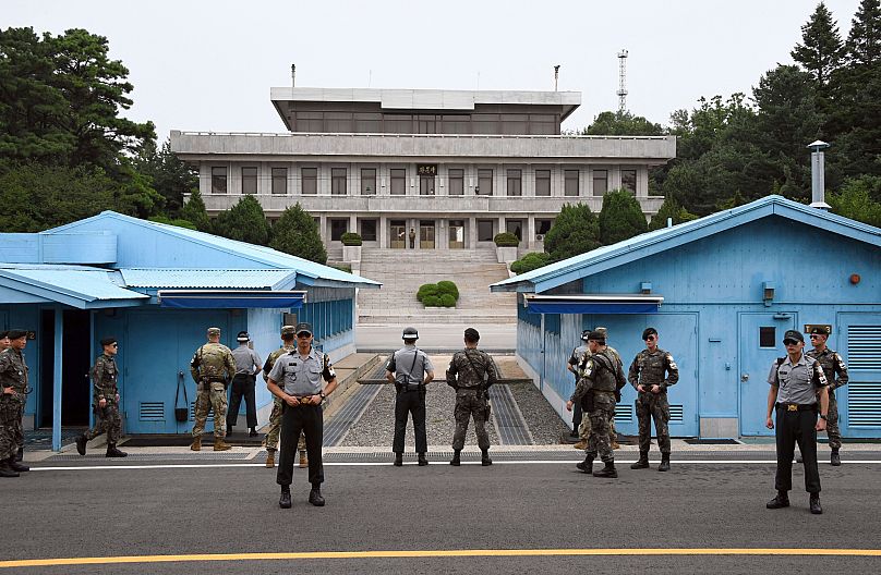 Soldiers of South Korea and the US stand guard in the Demilitarized Zone (DMZ) dividing the two Koreas, 27 July, 2017