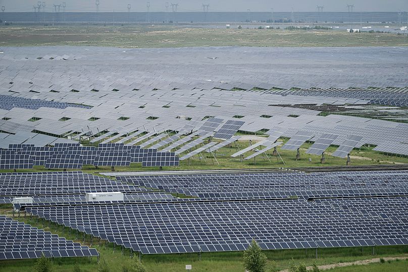A solar farm is visible in Hainan prefecture of western China's Qinghai province.