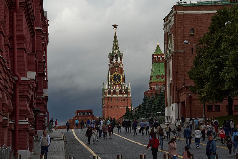 People walk though Red Square in Moscow, 14 August, 2025