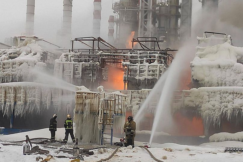 Firefighters extinguish a blaze at Russia's second-largest natural gas producer Novatek in Ust-Luga, 21 January, 2024