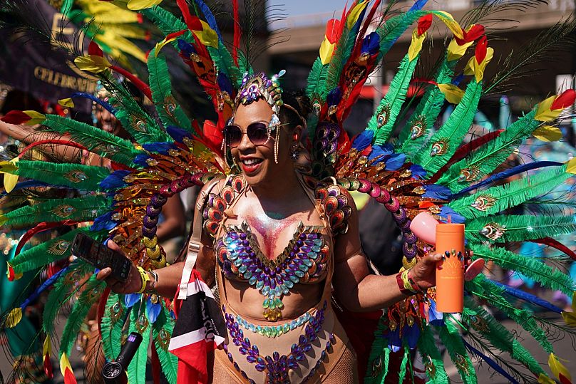 Revellers often spend several months preparing the intricate costumes for the parade