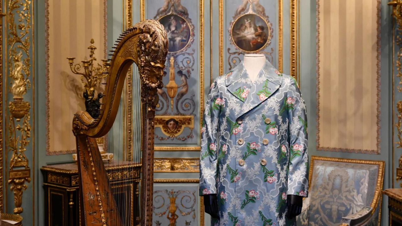 Gucci topcoat on show at the Louvre Couture exhibtion 