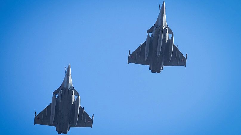 France's Rafale fighter jets fly over the city center during celebrations of the 107th anniversary of the Republic of Estonia, in Tallinn, Estonia, 24 Feb, 2025.
