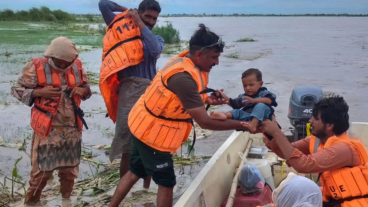 Evacuations under way in eastern Pakistan as India releases water from swollen rivers